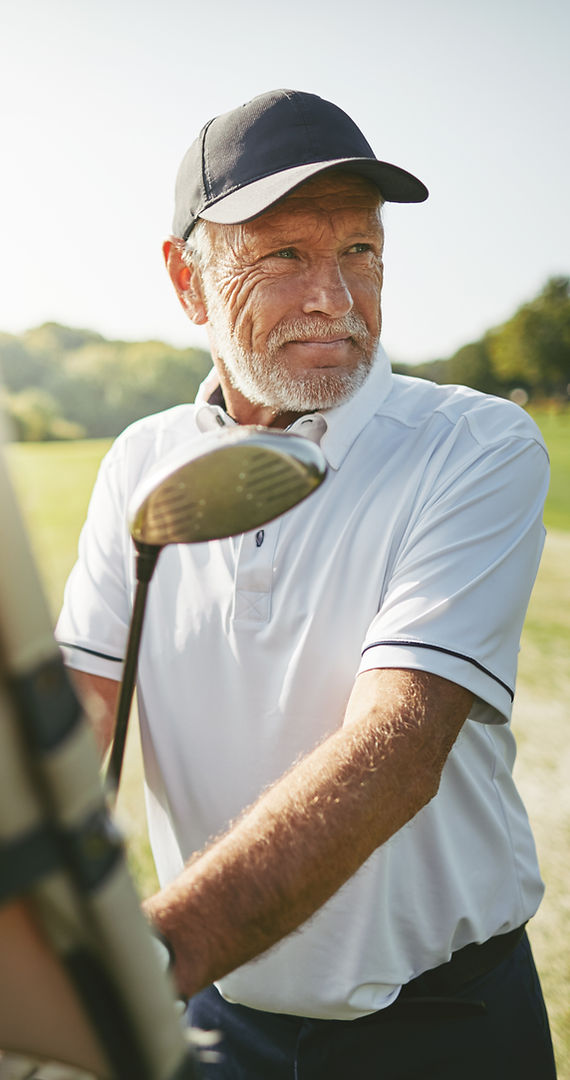 Retired high net worth individual playing golf